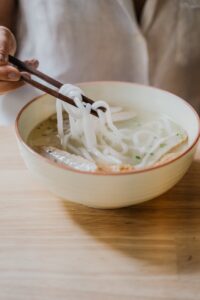 close up of a bowl of noodle soup